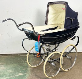 A Vintage Baby Carriage - Possibly Peg Perego