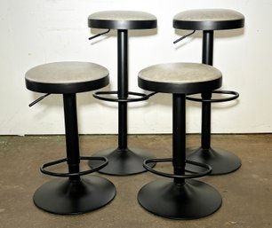 A Set Of 4 Adjustable Height Modern Stools With Leather Seats