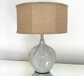 A Modern Ceramic Lamp With Glam Linen Shade