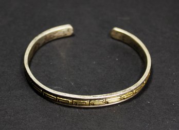 FINE STERLING SILVER CUFF BRACELET HAVING GOLD 'GREEK KEY' PATTERN