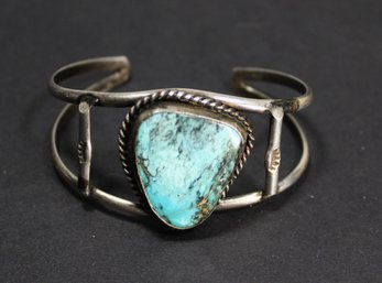 SOUTHWESTERN STERLING SILVER CUFF BRACELET HAVING LARGE TURQUOISE STONE