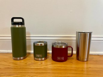 Four Yeti Insulated Beverage Containers