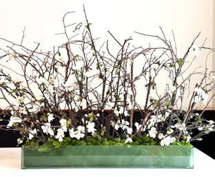 A Large High Quality Faux Floral Display In Modern Glass Planter