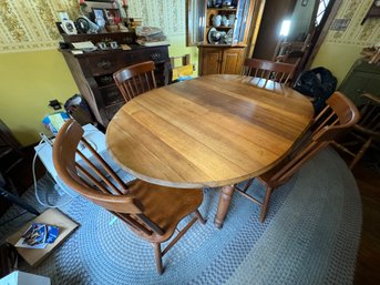 A PINE DROPLEAF TABLE W/ 4 CHAIRS