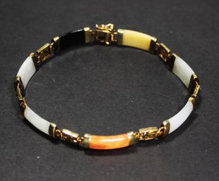 GILDED STERLING SILVER MULTI COLORED JADE LINK BRACELET HAVING CHARACTERS