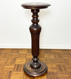 An Antique Turned Mahogany Pedestal