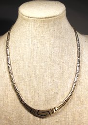 FINE STERLING SILVER NEACKLCE HAVING 'GREEK KEY' PATTERN