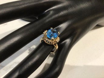 Ladies 14K Yellow Gold .10MX12M Oval Blue Topaz With Diamond Accent Ring Size 7  #1