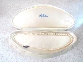 Graduated String Of Pearls In Plastic Clam Shell Jewelry Box