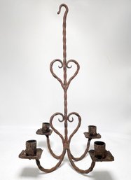 A Wrought Iron Hanging Candelabra