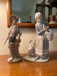 Pair Of Porcelain Lladro Figurines - Shepherdress With Ducks & Fisher Boy