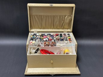 A Vintage Sewing Box With Supplies