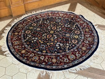 A Round Indo-Persian Wool Carpet