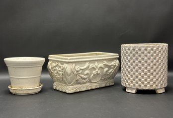 A Grouping Of Three Compatible Ceramic Planters