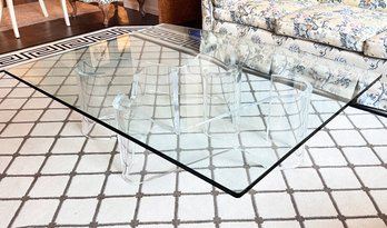 A Vintage Modern Coffee Table With Lucite Base