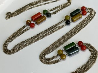 A Vintage Deco Revival Art Glass And Brass Flapper Length Necklace