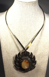 LARGE STERLING SILVER TORQUE NECKLACE HAVING LARGE INDONESIAN PENDANT W CARNELIAN STONE