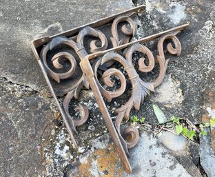 A Pair Of Decorative Cast Iron Brackets