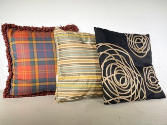 A Trio Of Decorative Pillows