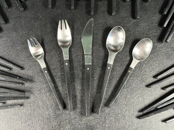 A Set Of Vintage Danish Modern Flatware In Stainless Steel With Black Handles By Raavad, Made In Denmark