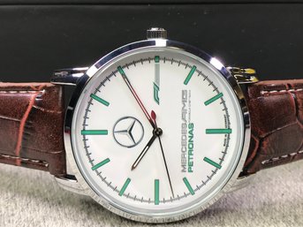 Interesting MERCEDES BENZ AMG Formula One Team Petronas Watch - Silver Tone Case - Brown Crocodile Strap