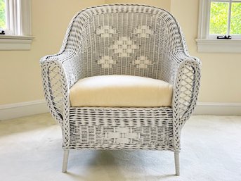A Vintage Wicker Arm Chair