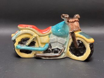 A Ceramic Motorcycle Coin Bank