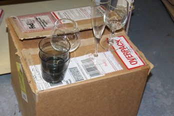 2 Boxes Full Of Assorted Wrapped Glasses