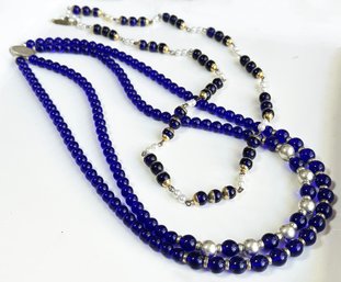 A Pair Of Antique Art Deco Blue Glass Necklaces