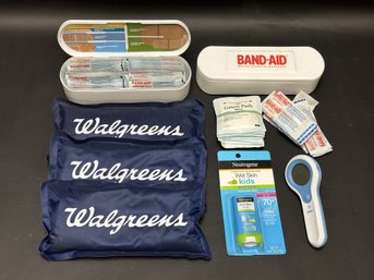 Assorted First Aid Supplies: Ice Packs, Band-Aids & More