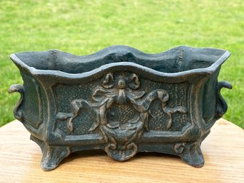 An Antique Cast Iron Planter