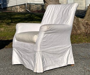 A Modern Slip Covered Arm Chair In White Linen