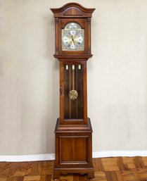 A Vintage Grandmother Clock By Howard Miller