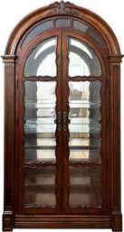 A Splendid Fruit Wood China Or Bar Cabinet With Wavy Glass Panels In Spanish Revival Style By Ralph Lauren