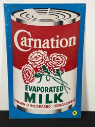 A CARNATION EVAPORATED MILK SIGN