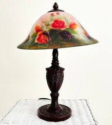 A Bronze Tone Accent Lamp With Painted Shade