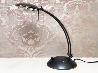 A Modern Desk Lamp In Oil Rubbed Bronze Finish