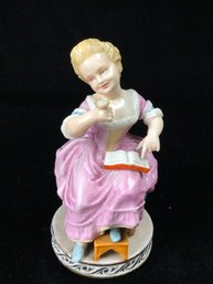 Women In Pink Dress Figurine