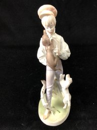 Boy With Hound Dogs Figurine