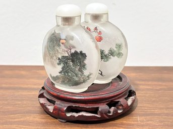 A Pair Of Fine Quality Reverse Glass Snuff Bottles