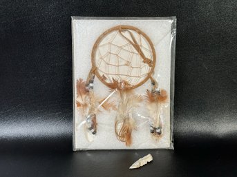 A Dreamcatcher & An Arrowhead