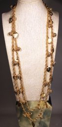 Elongated Gold Tone Charm Necklace Having Heart Charms By NAPIER 60' Long