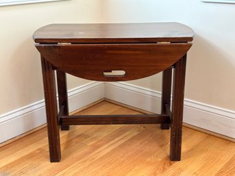 A Petite Vintage Side Table In Pine With Drop-Leaf Sides