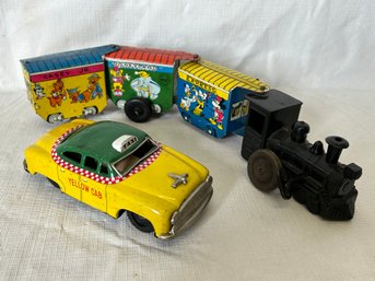 Pair Of Vintage Tin Litho Toys- 1960S MARX DISNEYLAND EXPRESS And 1950s JAPANESE FRICTION TAXI