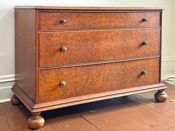 An Antique Tiger Maple Veneer Chest Of Drawers With Bun Feet