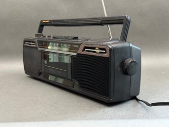 A Vintage GE Boombox With Cassette & Bass Boost