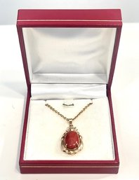 Delicate 750 (18K) Necklace With 18K Red Coral Oval Pendant