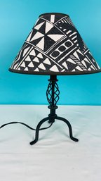 Metal Based Table Lamp With Black And White Shade