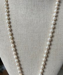 KNOTTED PEARL NECKLACE 25 3/4' LONG 14K GOLD CLASP