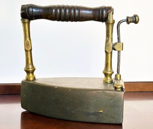 An Antique Brass Steam Iron
